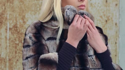 Woman Posing in Fur Coat Outside
