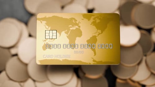Credit card falls on gold coins. Online payment concept. Banking services. Cryptocurrency exchange.