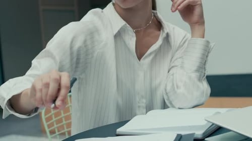 Female Office Employee Starting Dancing in Middle of Paperwork at Workplace