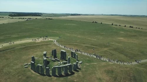 Aerial orbits world famous prehistoric monument Stonehenge in UK
