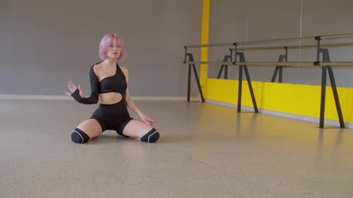 Pink Hair Dancer Performing Contemporary Dance in Studio