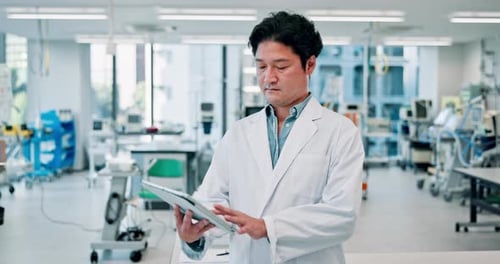 Research, tablet and science with Japanese man in laboratory for medical school