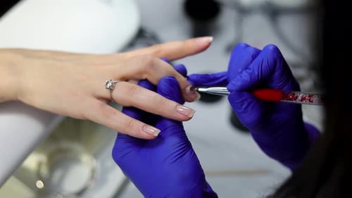 manicure done by a professional manicurist in slow motion