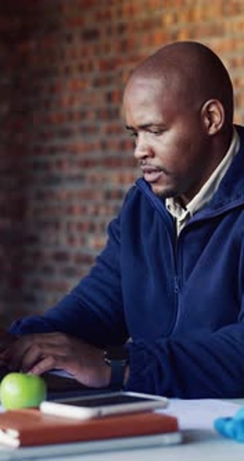Architect, laptop and typing with black man on construction site for planning or research