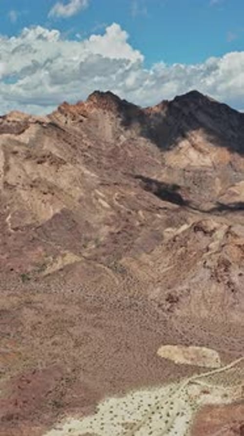 Aerial view of rugged terrain in Nevada showcasing mountain ranges