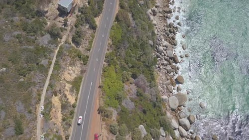 Aerial following car along coast in South Africa
