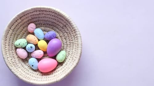 Overhead Shot of Colorful Easter Eggs in Basket