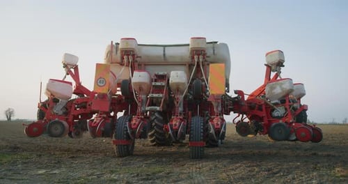 Close up of an industrial multifunctional modern plowing tractor is activating before to start wor