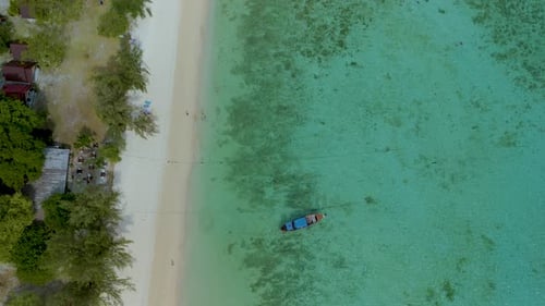 Explore the Turquoise Waters and Pristine Beaches of Koh Kradan Island Thailand