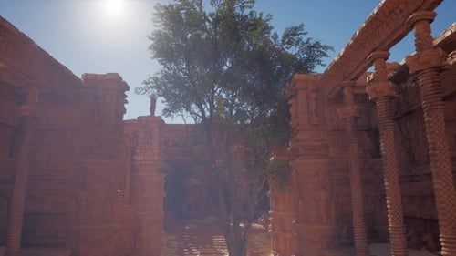 Un bâtiment en pierre avec un arbre en arrière-plan