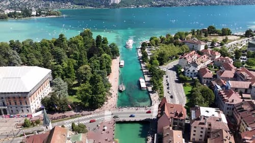 Aerial footage of Annecy and Lake Annecy nestled in the Alps, France