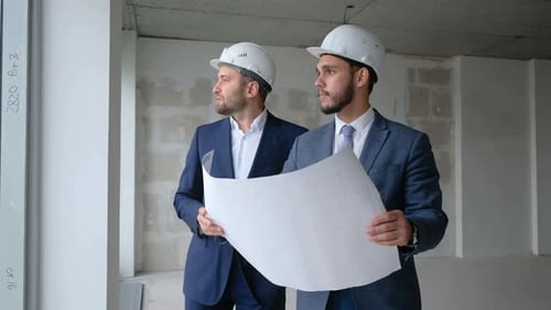 Construction Business Engineers Checking Site