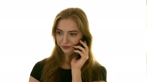 Woman Talking on Mobile Phone, White Background