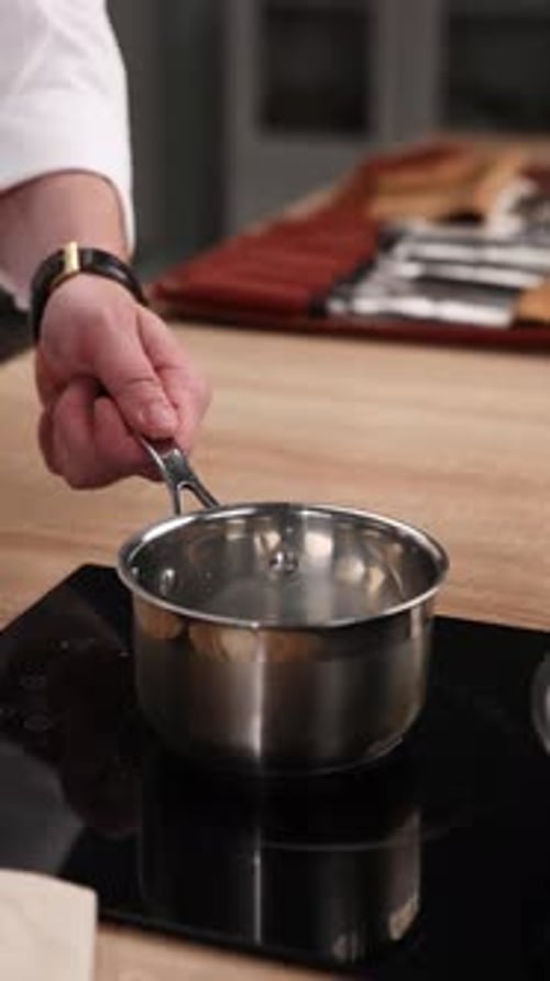 The chef is preparing milk. Close-up