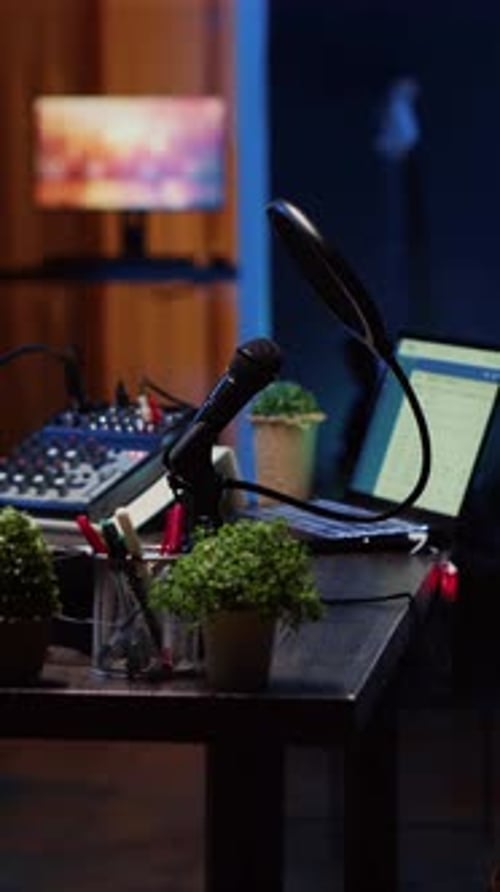 Vertical Video Empty Desk in Home Production Studio with Podcast Equipment Technology