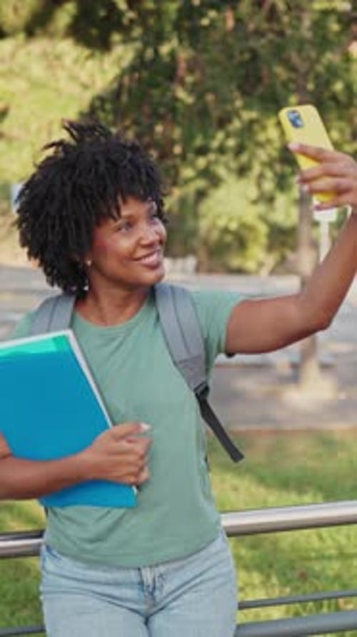 Happy Student Taking Selfie On Campus