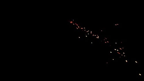 Glowing Embers and Particles Flying on Black Background