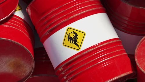 A Pile of Red Matal Barrels with Hazard Toxic Materials Industrial Environmental Issue Concept 3d