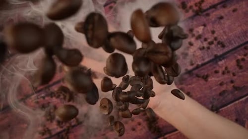 Roasted Coffee Beans Falling With White Smoke