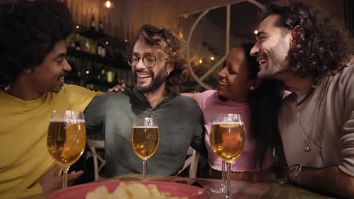 Group Multiracial Colleagues Gathered Chatting Happily Restaurant Bar After Work
