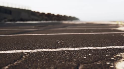 Empty Beach Car Park Spaces Covered in Asphalt