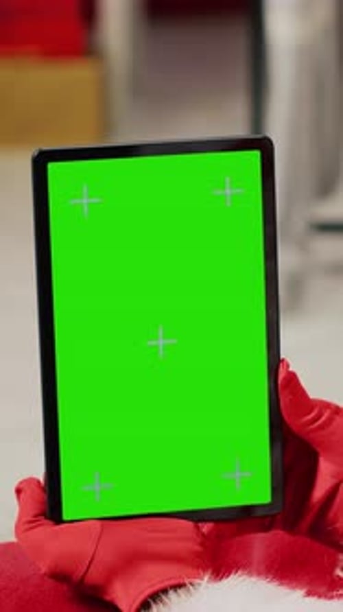 Vertical Video Santa Holding Chroma Key Tablet