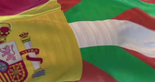 Spain and Basque Country Flags Waving
