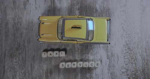 The Inscription Taxi Service And Yellow Car