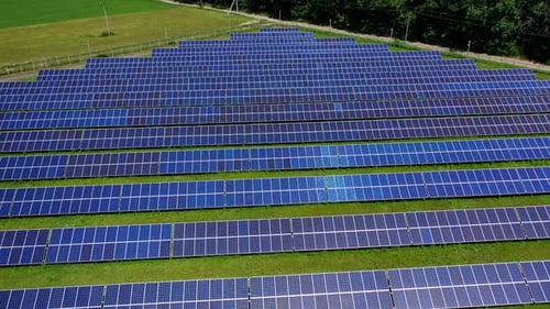 Solar cell panels field. Blue solar panels farm for clean energy.