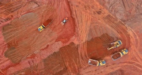 Aerial View of Construction Equipment on Dirt Lot