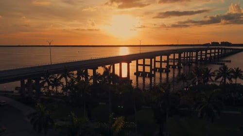 Sanibel Causeway at sunset, Florida, USA. Aerial drone ascending