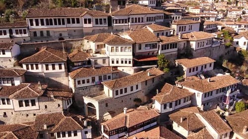 Flying Over Tiled Roofs of Houses Mosques and Minarets in Berat Albania Magnificent Ottoman