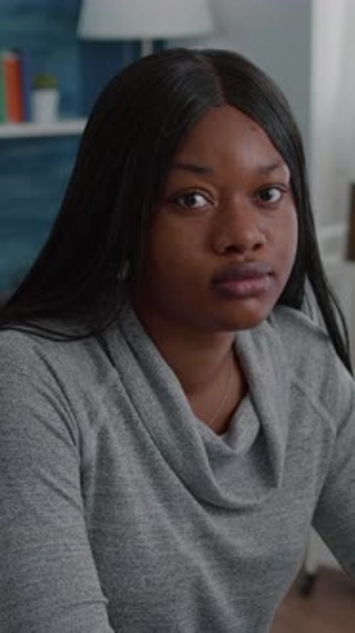 Smiling Young Adult Woman with Long Dark Hair