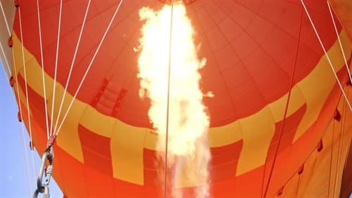 Hot air balloon burner close up inflating balloon