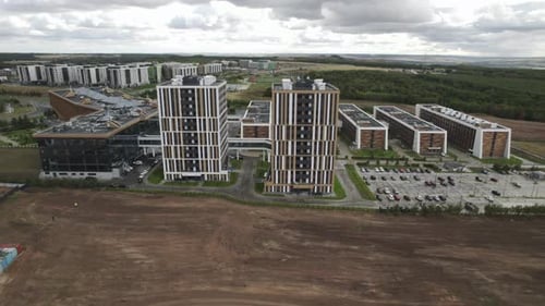 Suburb of Town with Residential Areas Contrasts with Nature