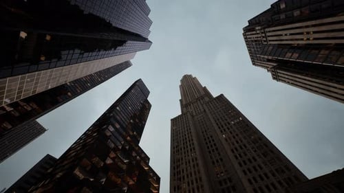 Looking Up Manhattan Skyscrappers With Skies