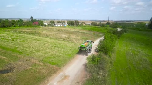 Spray Fertilize On Field With Chemicals In Agriculture Field