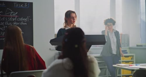 Teenage Girl Giving Presentation to Classmates