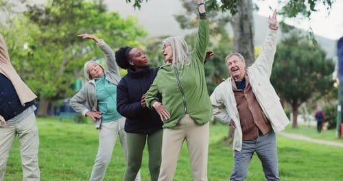 Yoga class, park and senior group with instructor exercise together in nature for health