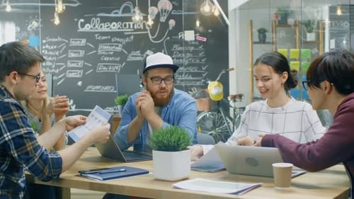 Team Meeting Collaboration in Modern Office