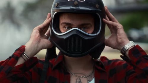 Man Putting Off Motorcycle Helmet Bali Male Motorcyclist Sitting on Motorbike Palm Tree