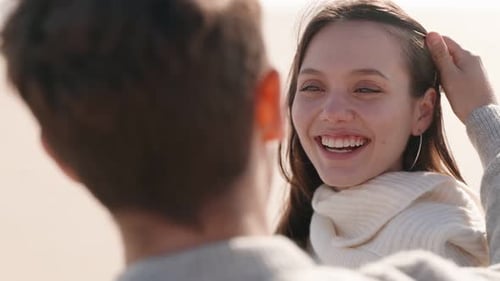 Loving Couple Enjoying A Romantic Moment At The Beach