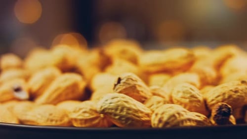 Close-up of Peanuts in Shells on Plate