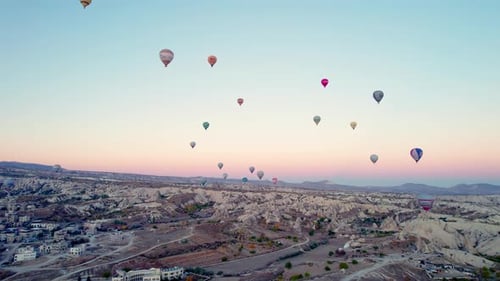 Aerial View of Hot Air Balloons at Sunrise