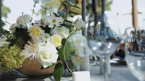 Elegant Wedding Table Setting With Floral Arrangement