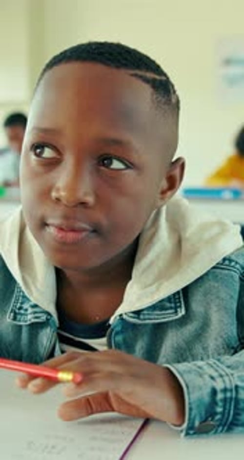 Thinking, education and child in classroom for test, math and quiz solution at school