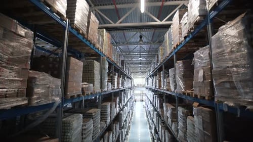 Big Factory Warehouse. Store Aisles. Camera Travels Inside a Large Store. Warehouse