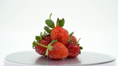 Strawberry close up on white background isolated 4K