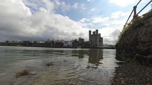 Timelapse historic Caernarfon castle Welsh medieval harbour waterfront town landmark