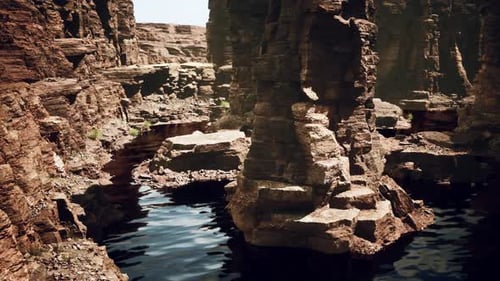 Beautiful Red River and Shores of Colored Sandstone